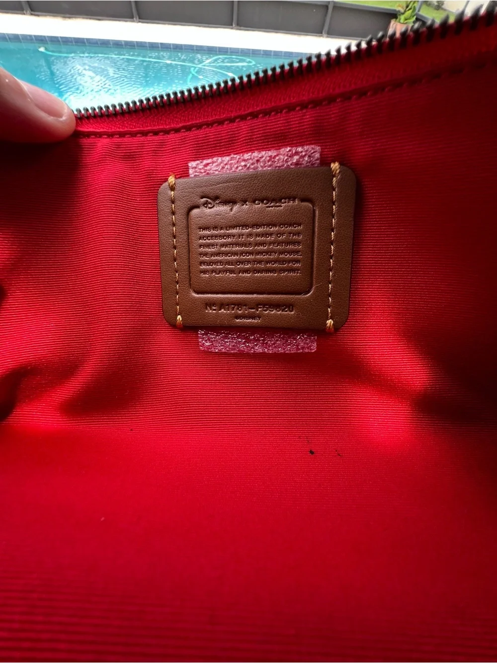 Coach Mickey Mouse Disney Red leather cosmetic zip bag F59820
